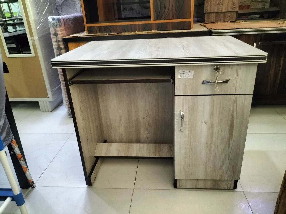 Wooden office table with drawers