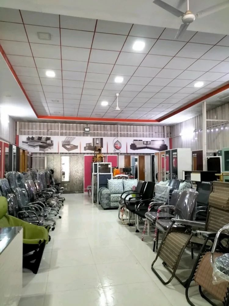 Aisles of furniture inside the Rajdhani Furniture World showroom